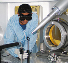 Scientist working with a laser
